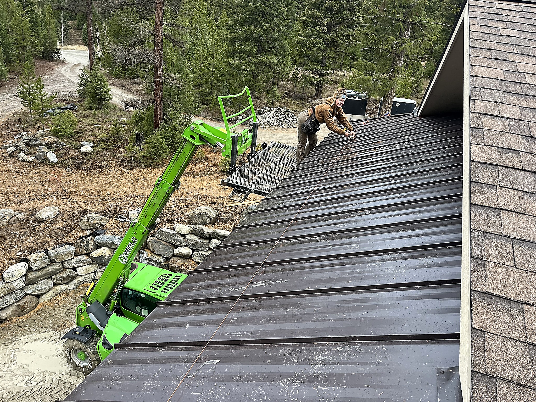 Flathead Valley Roofing installing a metal roof in Northwest Montana