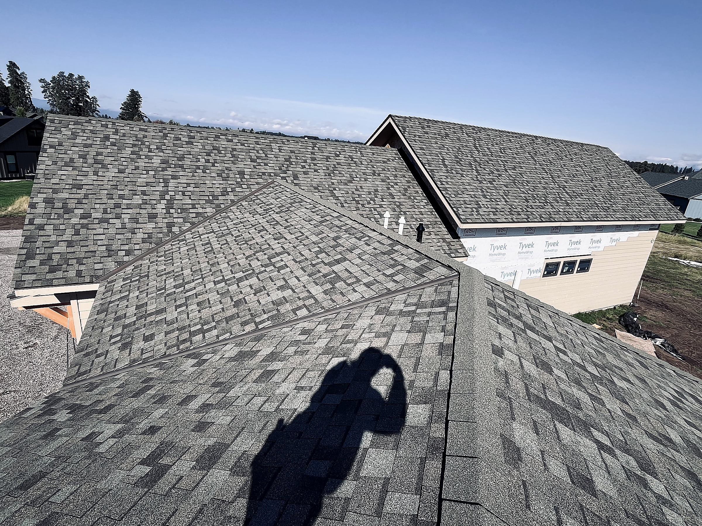 Large asphalt shingle roof with hips and ridges, Flathead Valley, Montana
