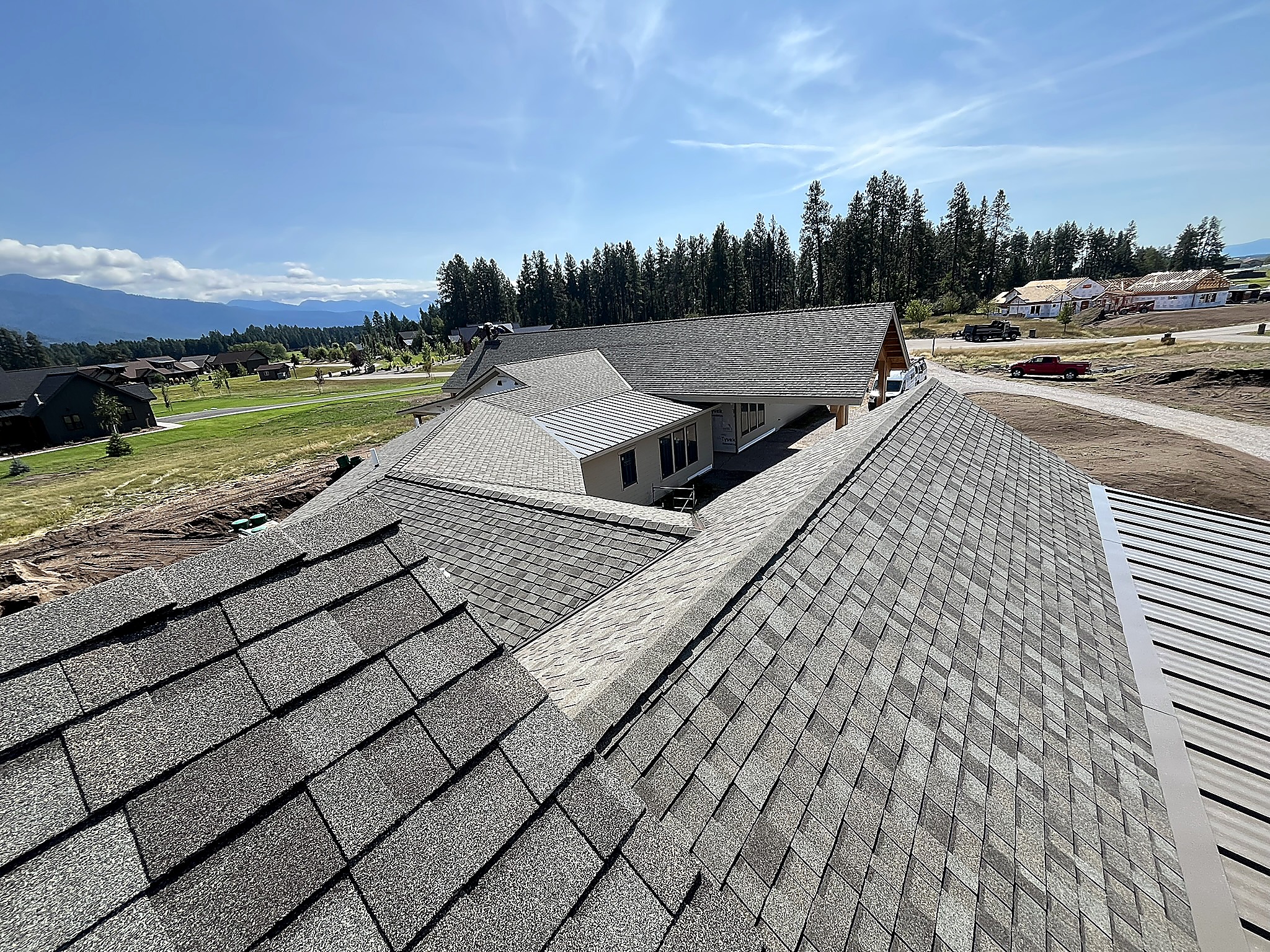 Overview of a combined shingle and metal roof in the Flathead Valley, Montana