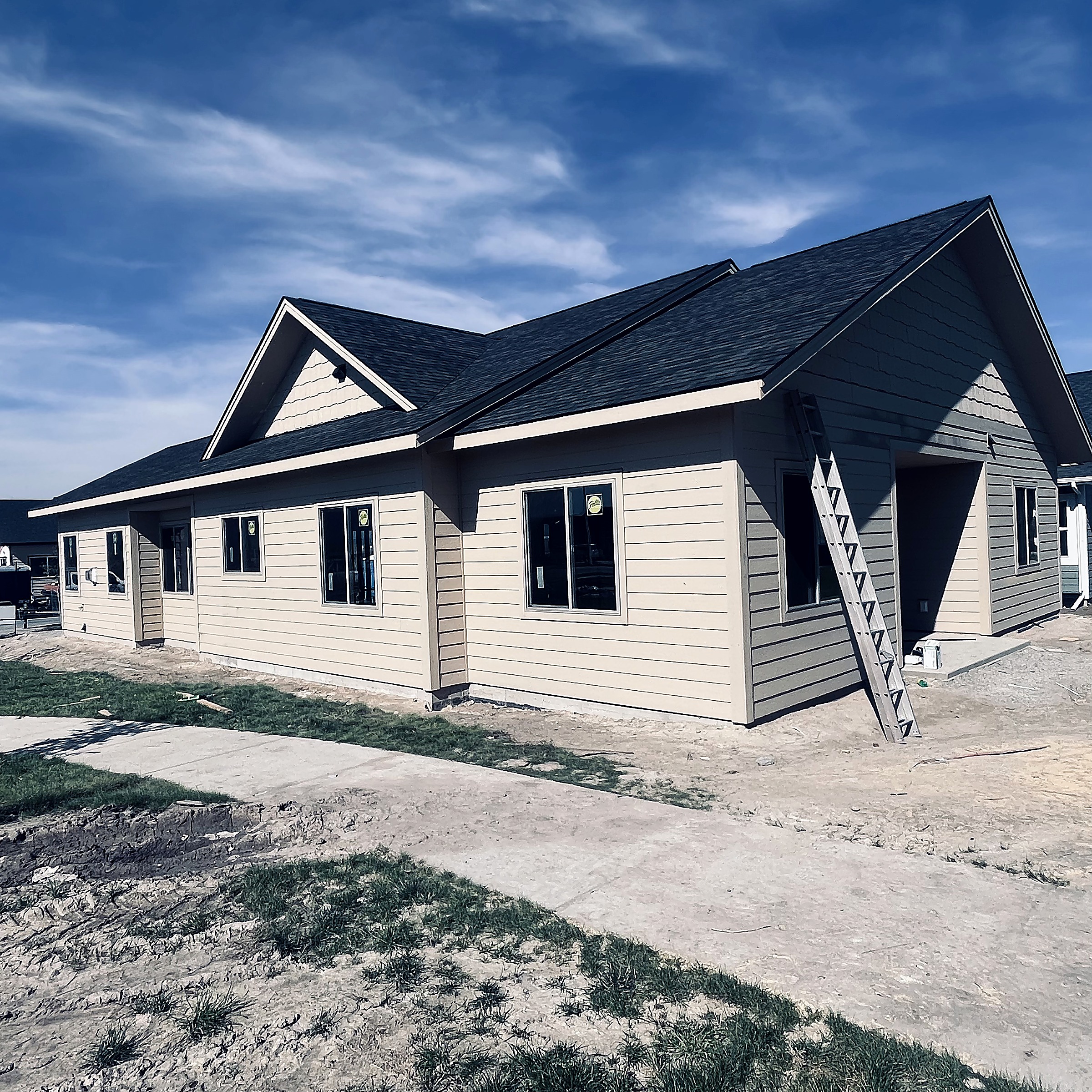 Completed asphalt shingle roof on a home in the Flathead Valley, Montana