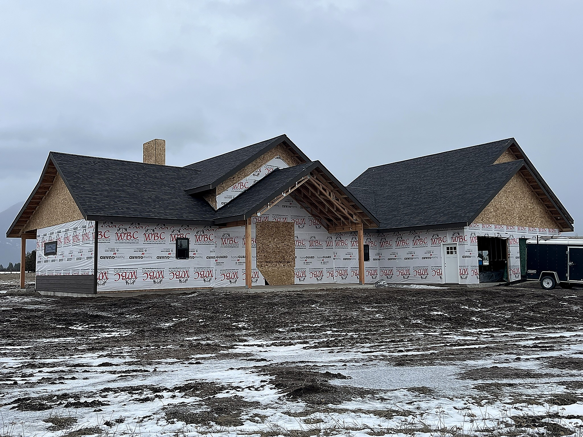 Asphalt shingle roof on a home under construction in the Flathead Valley, Montana
