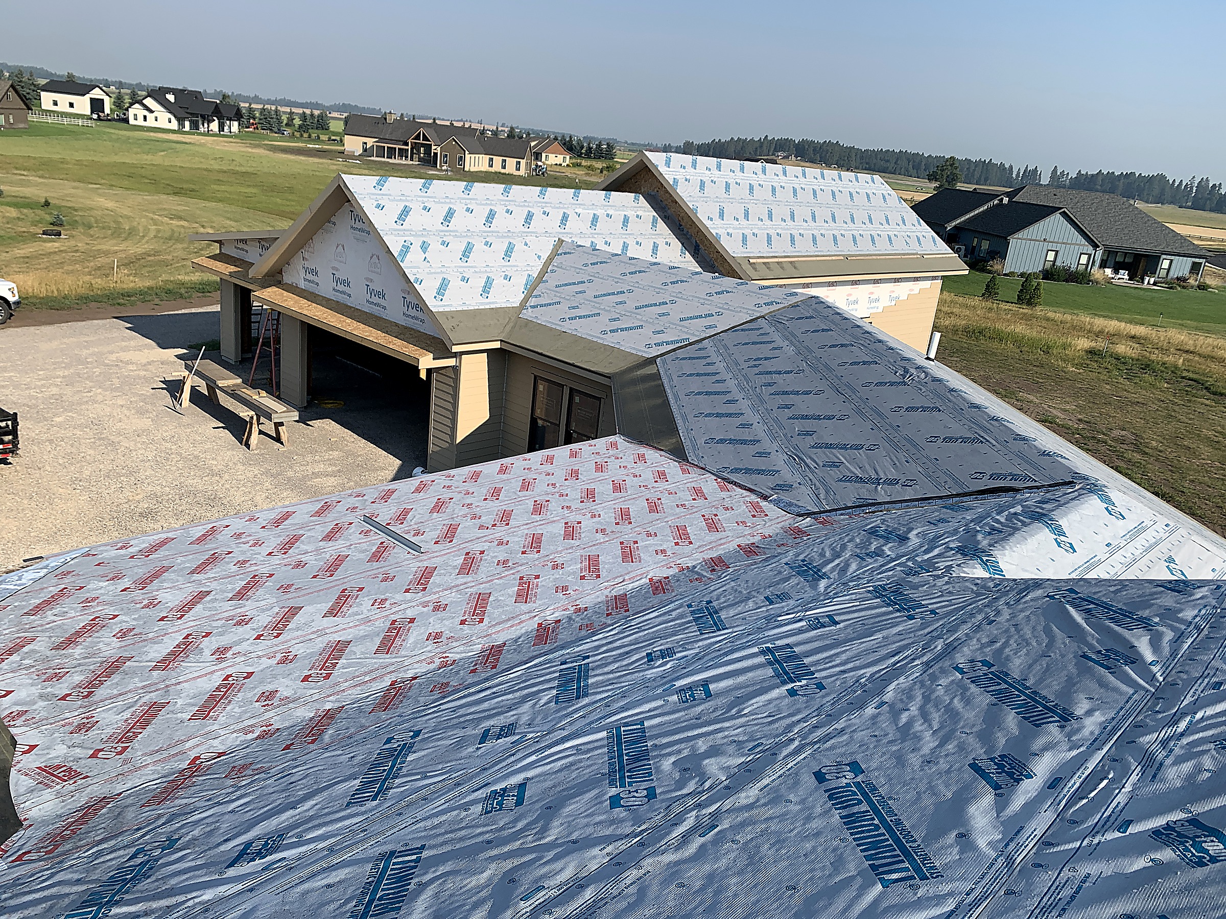 Synthetic underlayment installed on a roof before shingles, Flathead Valley, Montana