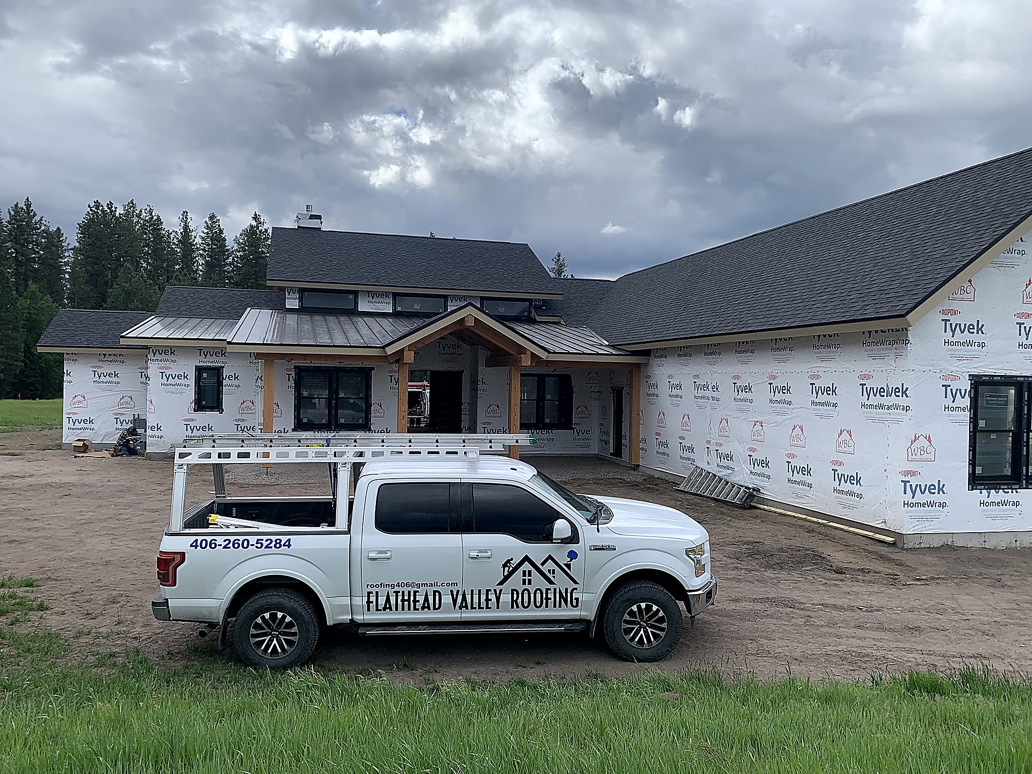 Flathead Valley Roofing truck at a roofing job site in the Flathead Valley, Montana