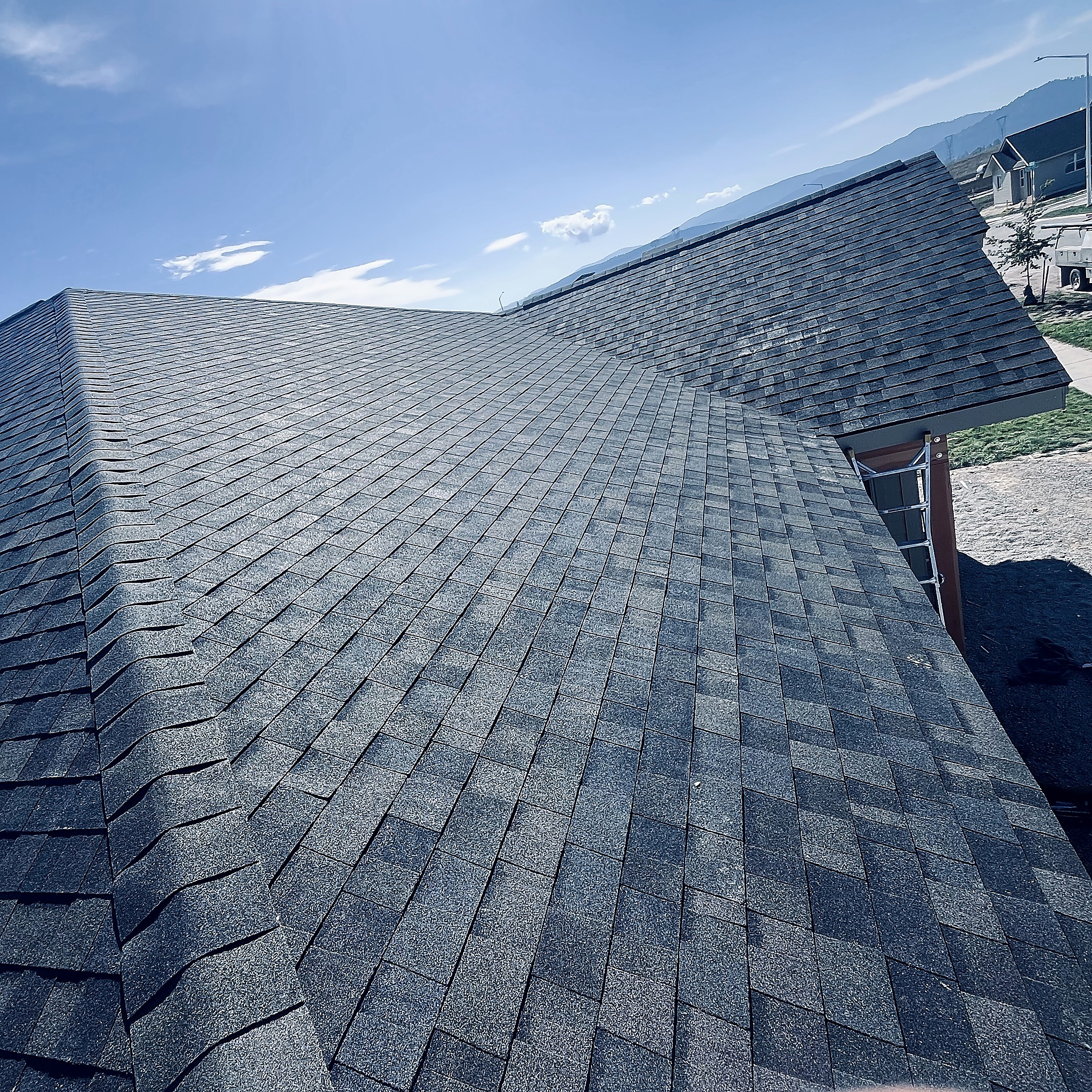 Asphalt shingle roof ridge detail, Flathead Valley, Montana