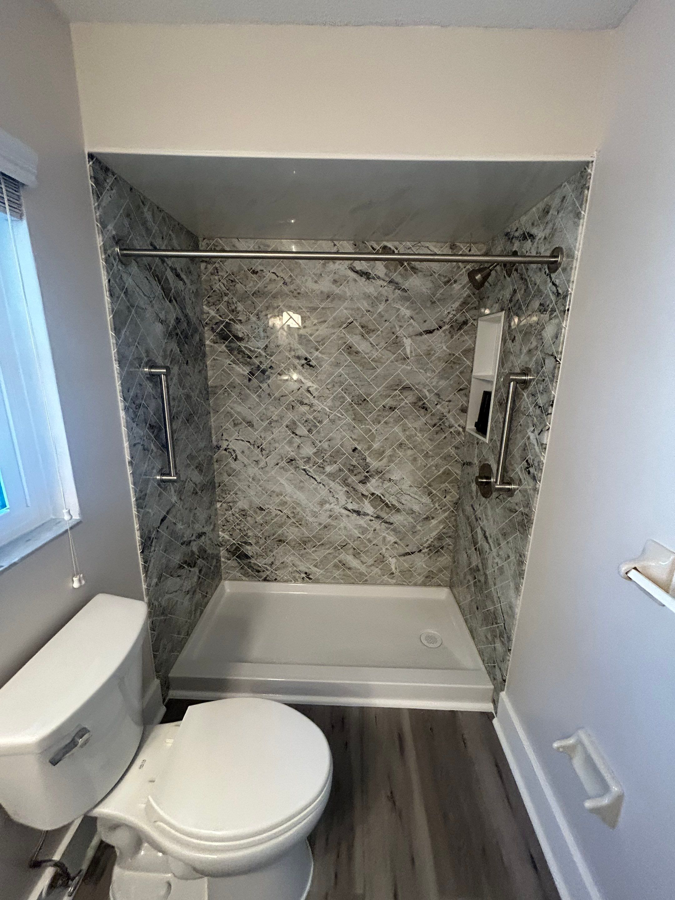 Finished modern walk-in shower after One & Done remodel