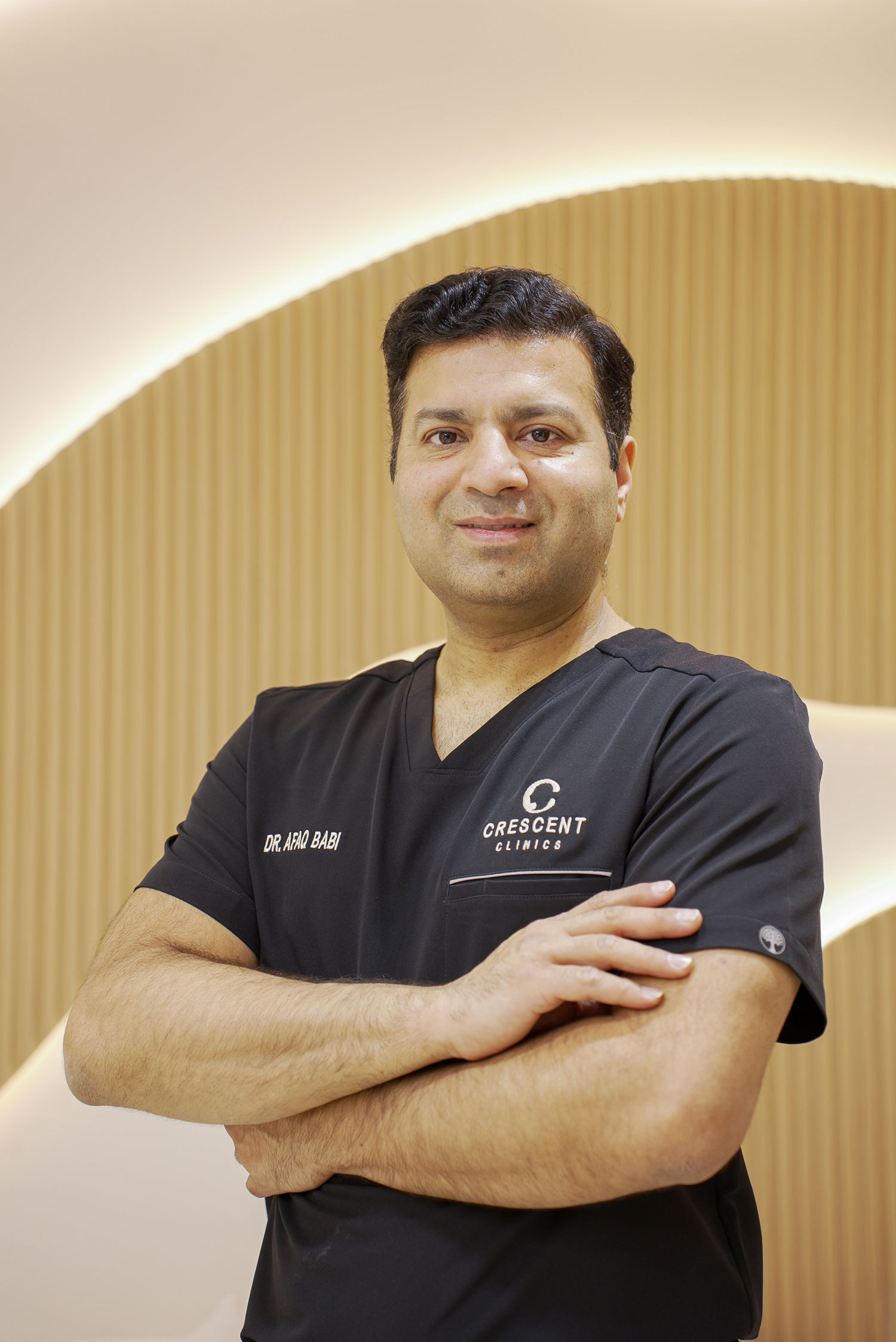 Dr. Afaq Babi - Founder, CEO & Principal Dentist at Crescent Clinics Dubai