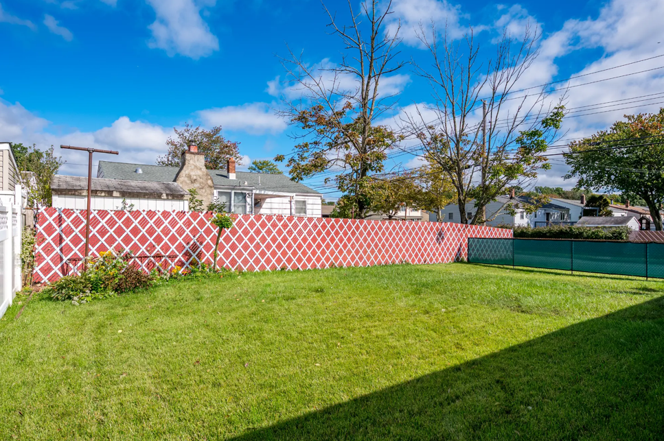 Private Level Fenced Backyard
