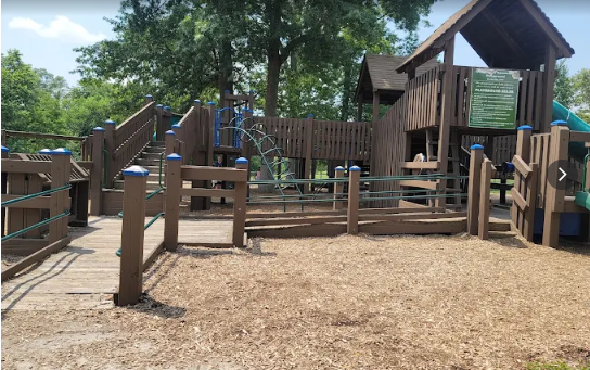 Merrill Park wooden multi-level adventure playground and trails