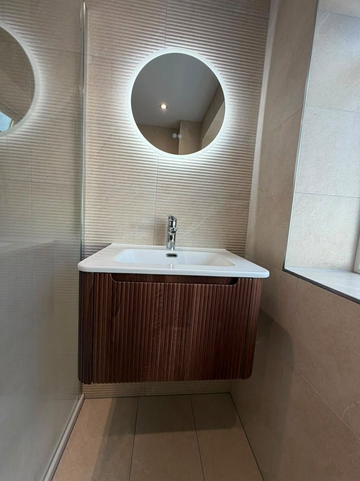 Modern bathroom vanity installation with halo LED mirror by MMA All Trades Dundee