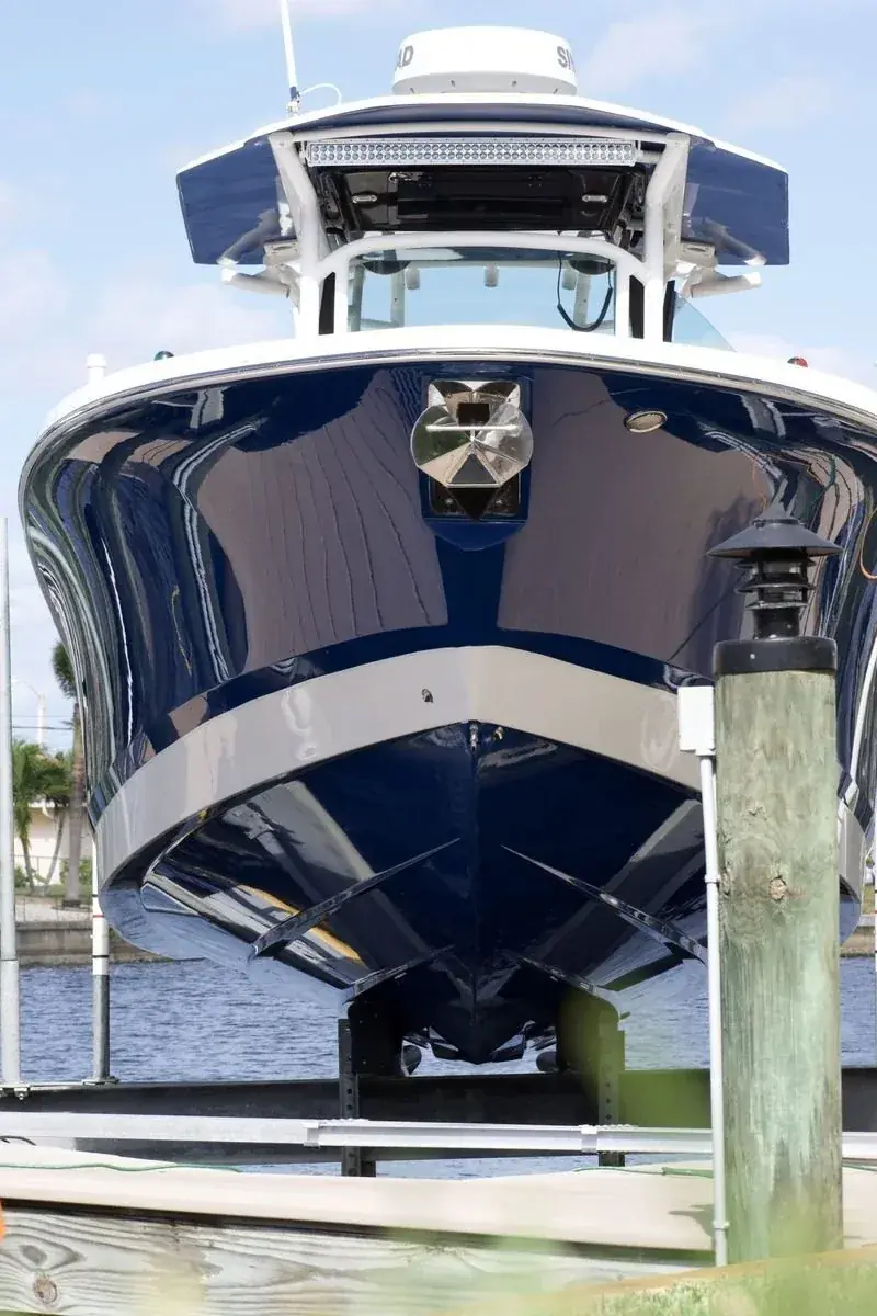 Boat on lift for repair assessment