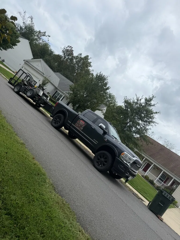 Austins Mowing & Mechanical Services work truck and mower trailer in Culpeper, VA