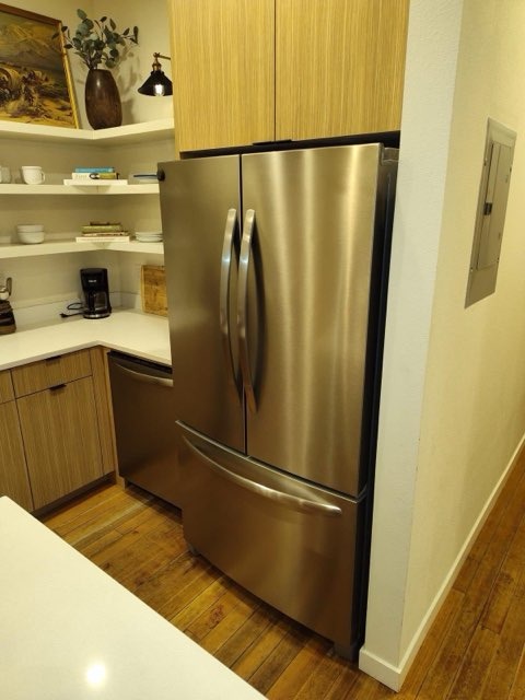 Gourmet Kitchen Island & Stainless Appliance Detailing