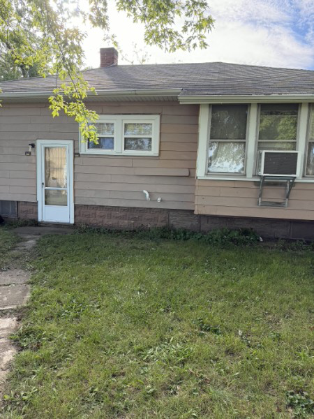 Outdoor intake and exhaust line run during an exterior home HVAC changeover