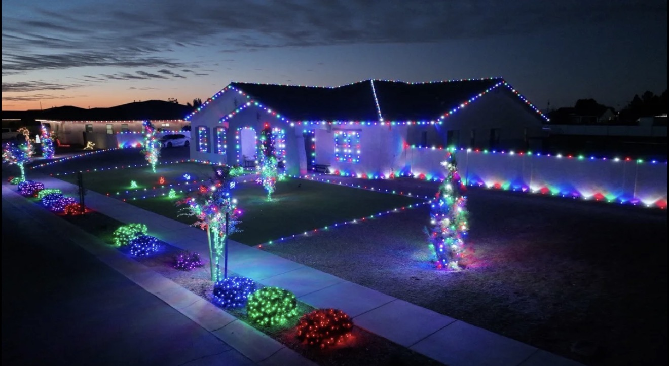 Full illuminated residential holiday lighting display maintained with in-season support and service