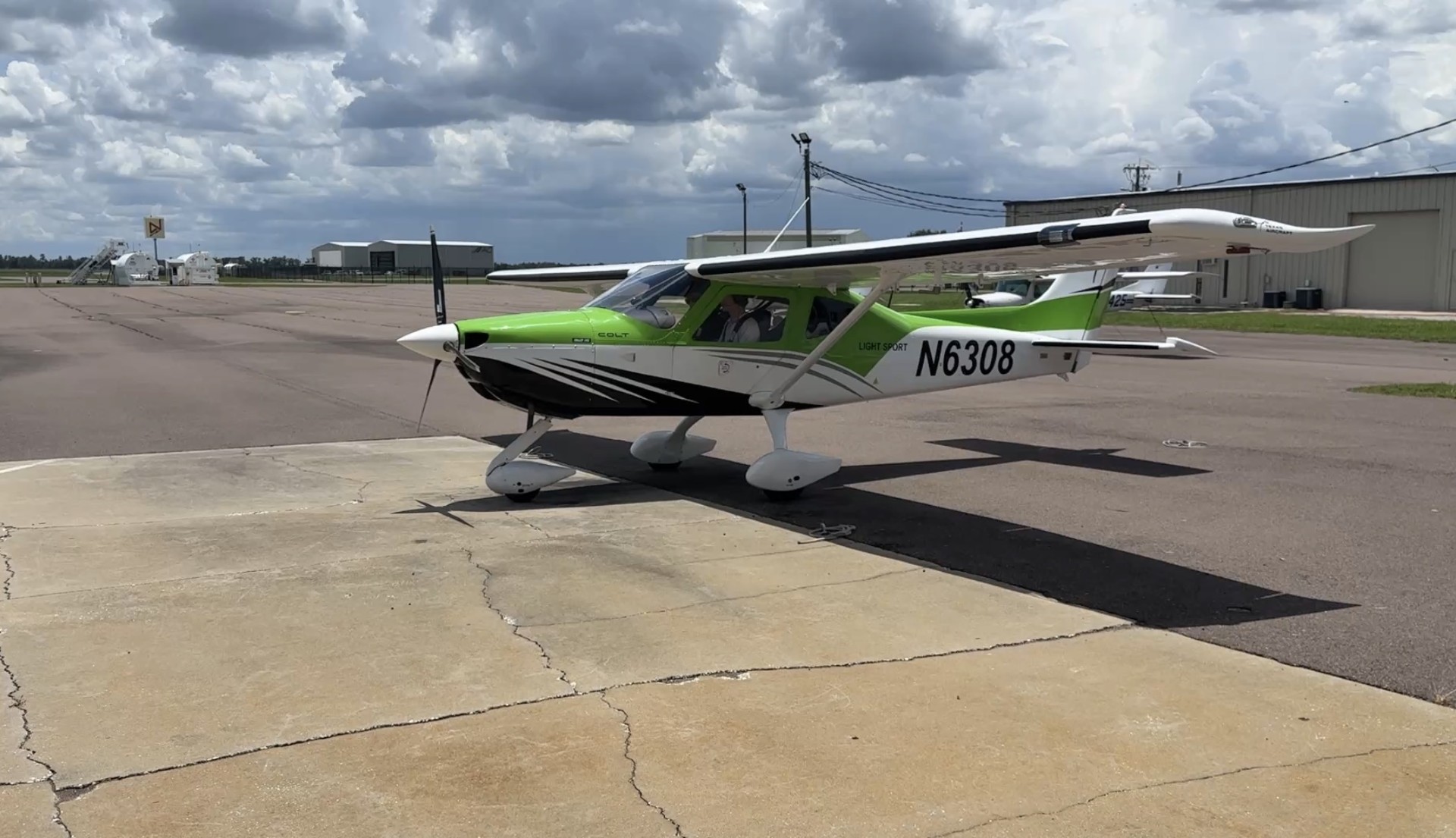 Legends Aviation green and white Texas Aircraft COLT Light Sport (N6308) on the ramp at Lakeland Linder Airport