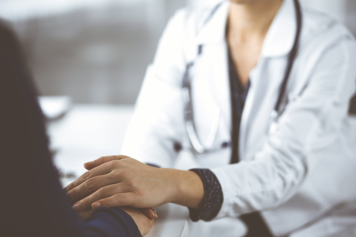 Physician hands providing care