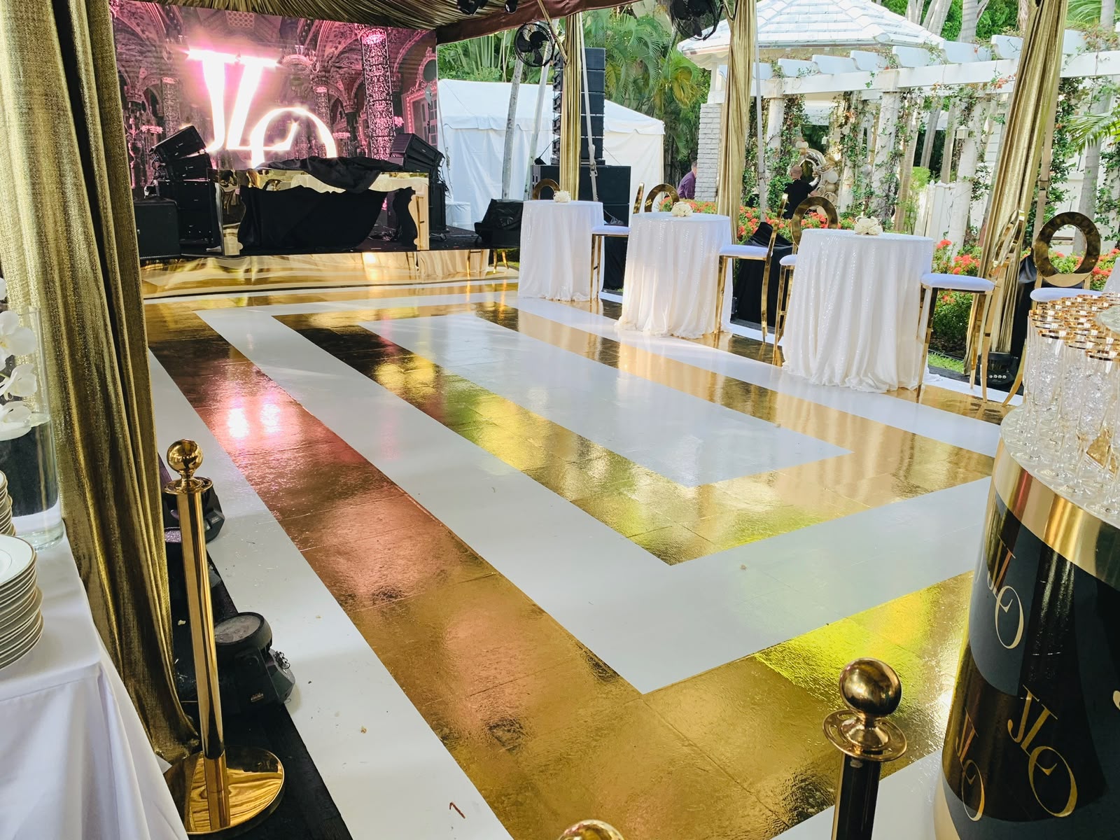 Luxury gold mirror geometric runway and dance floor wrap installation in Coral Gables FL