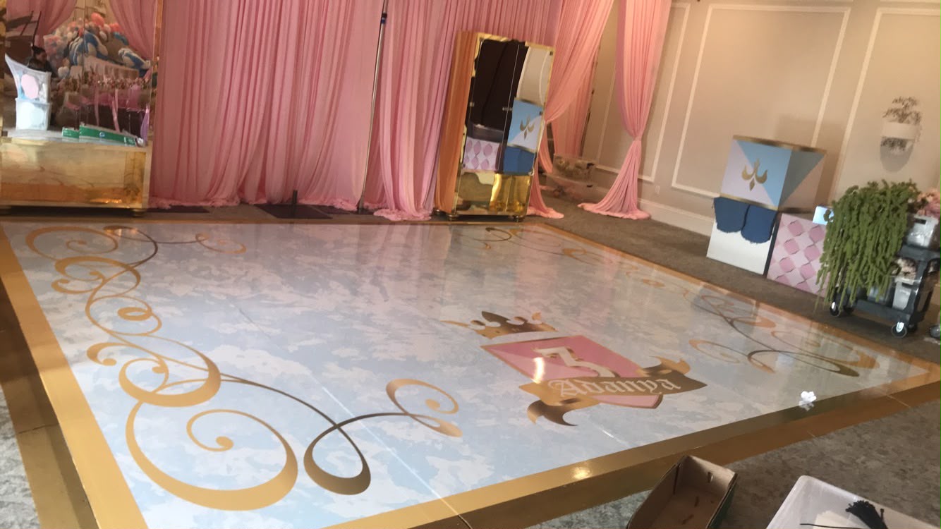 Royal crest with gold filigree swirl ballroom floor wrap for celebration in Kendall FL