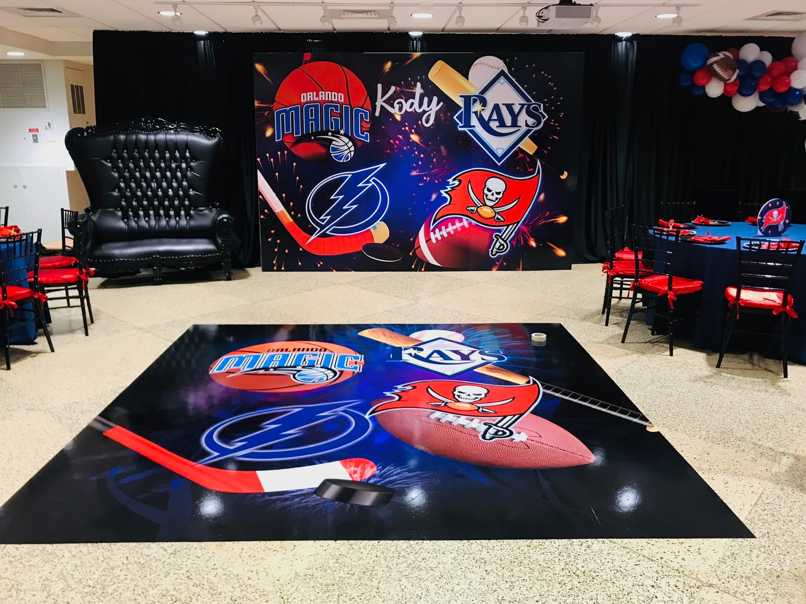 Custom sports theme event backdrop wall mural and coordinated graphic floor wrap in Kendall FL