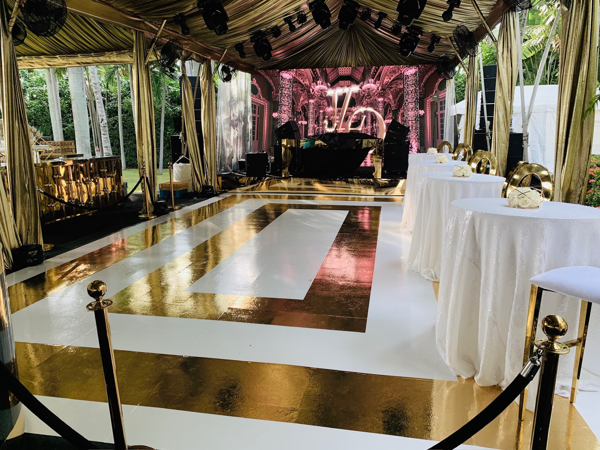 Luxury gold and white event floor wrap graphic installation in Miami FL