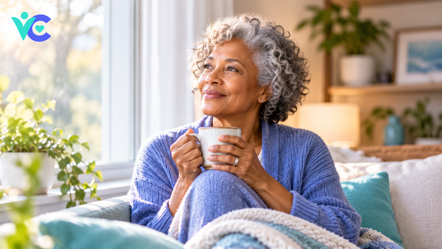 Woman relaxing calmly by the window with a warm cup