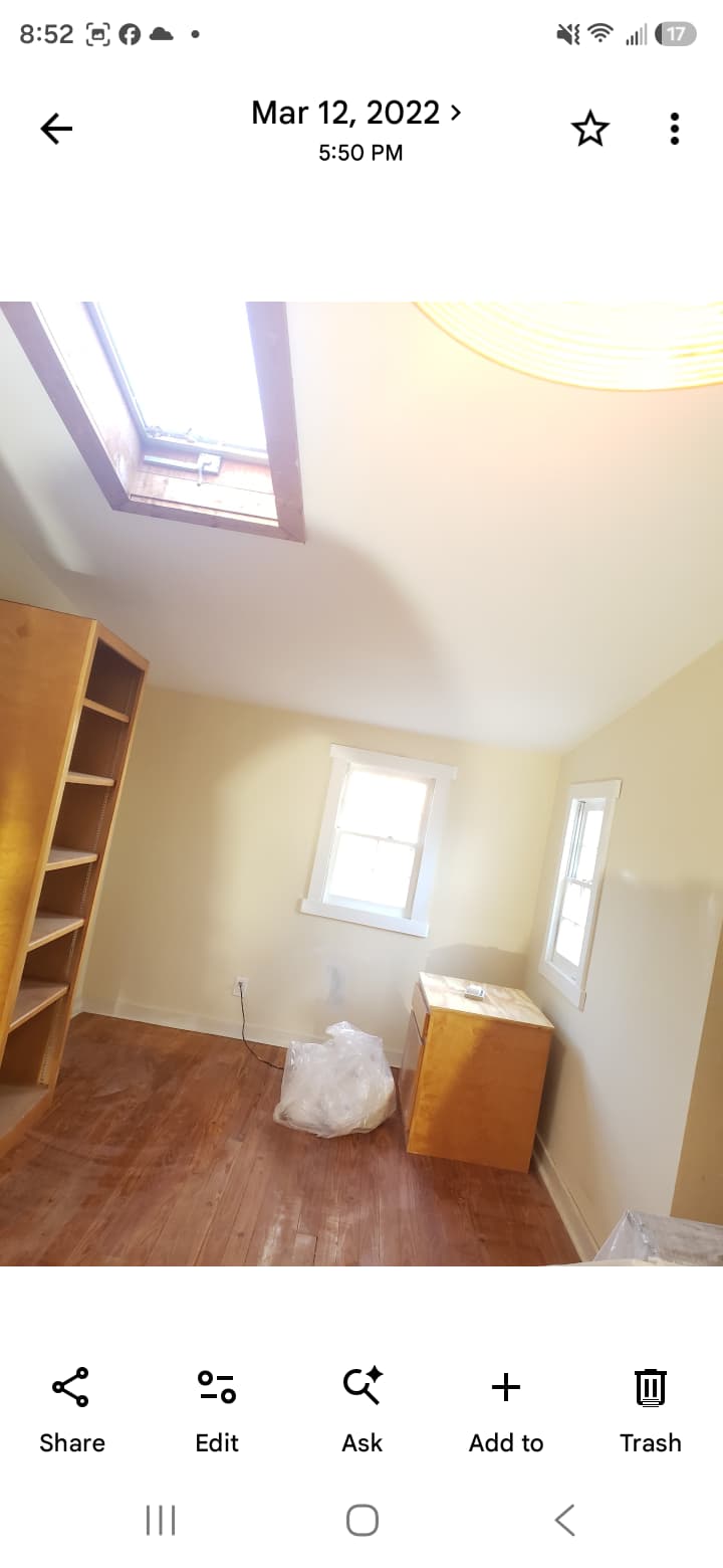 Sunroom interior painting, window casing trim and hardwood flooring restoration in Rome GA