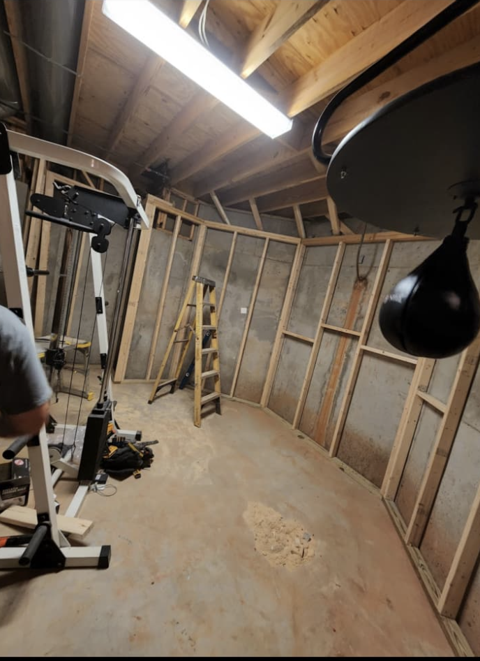 Basement framing and home gym renovation project by Quality Painting & Home Repairs in Cedartown GA