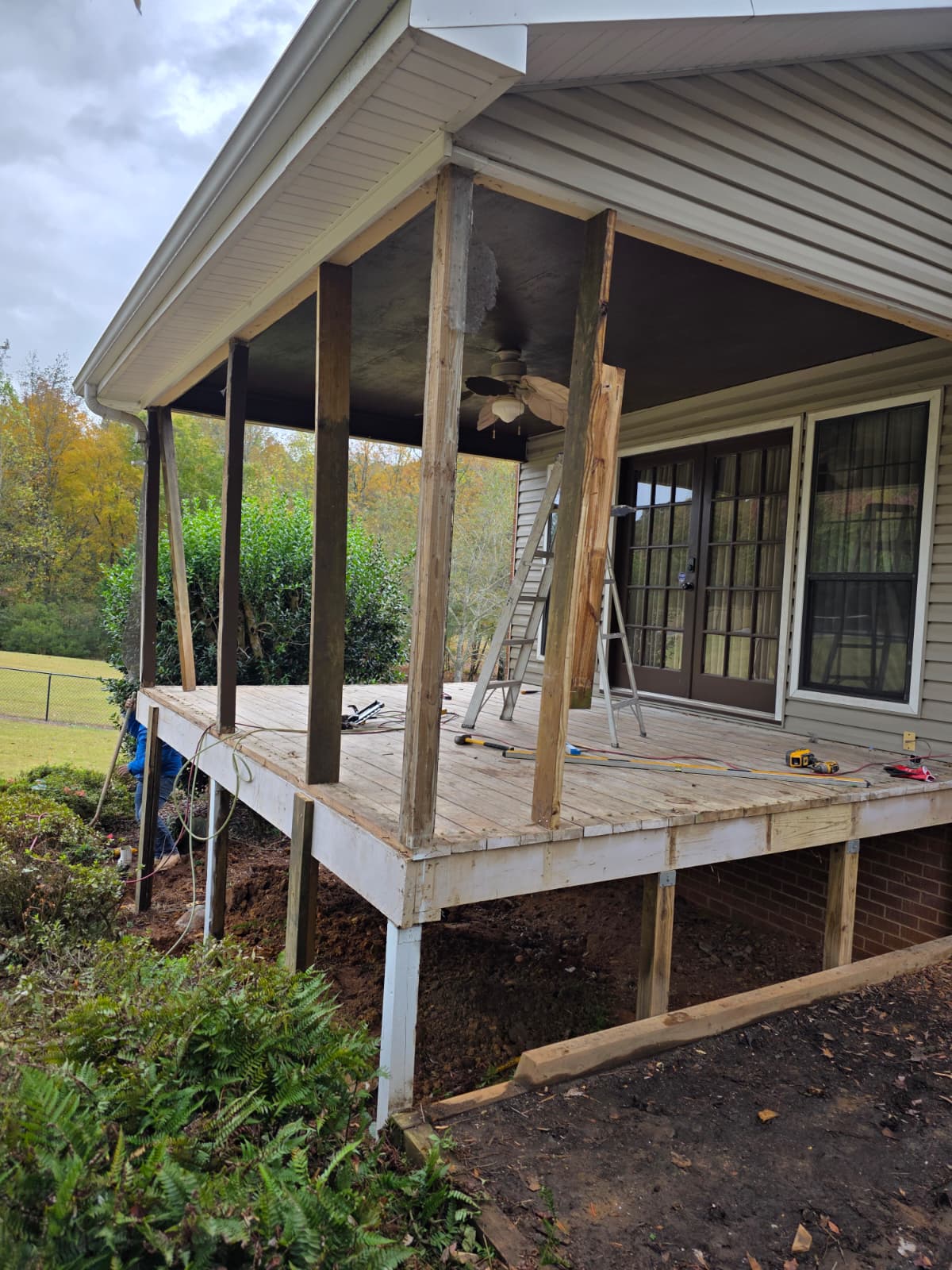 Covered porch support post replacement and foundation framing rebuild by Quality Painting & Home Repairs in Dallas GA