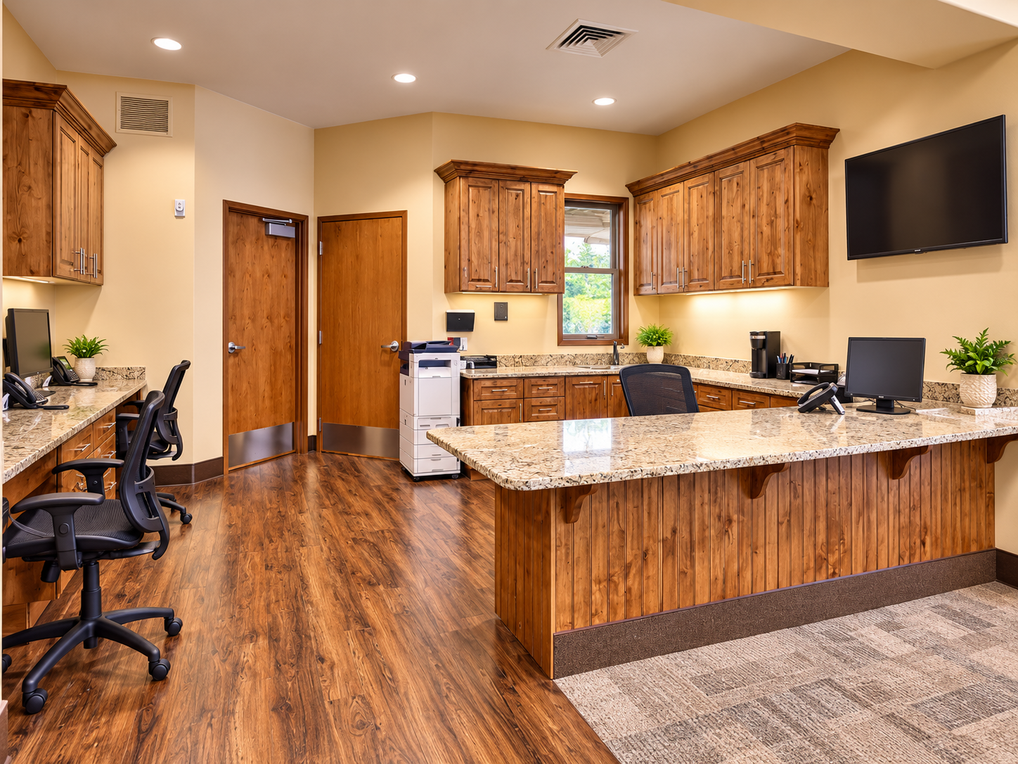 Warm, professional 24/7 nursing and administration station at Seasons