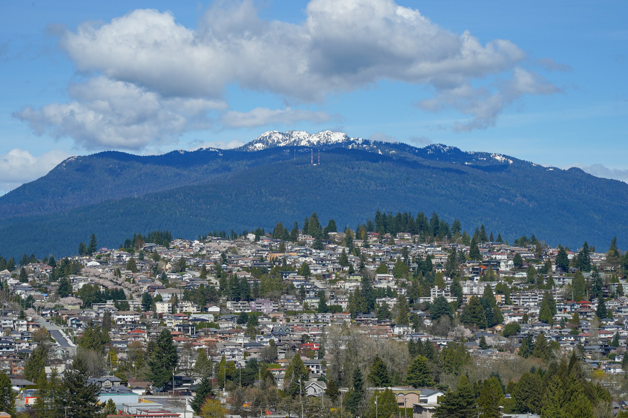 Vancouver residential neighbourhood with mountains in the background