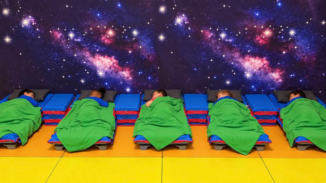 Peaceful rest & nap environment with cozy individual beds under starry ceiling