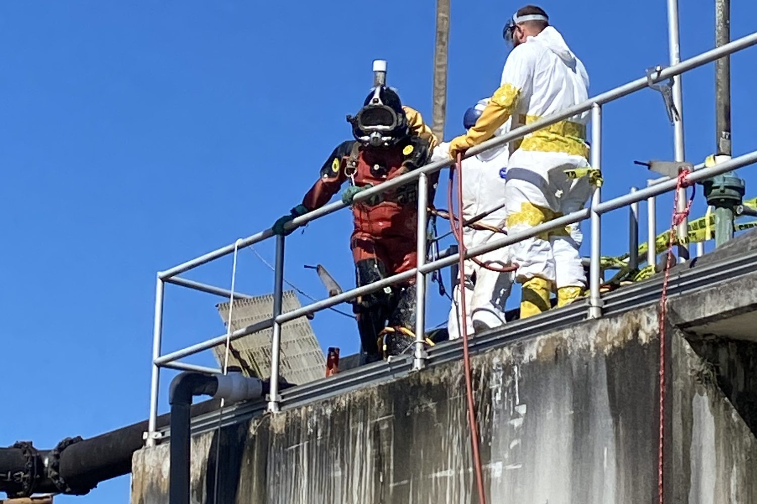 Commercial diver performing an underwater inspection.