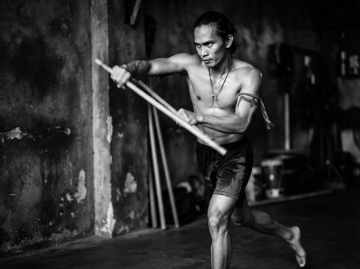 Folabi practicing martial arts with disciplined movement