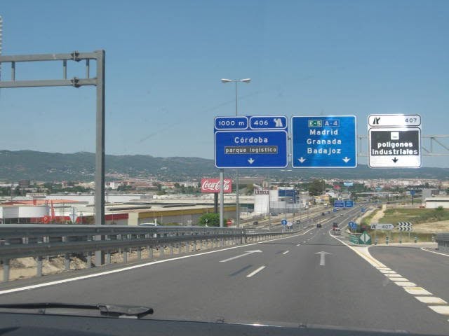 Highway road sign on the drive to Córdoba, Madrid, Granada and Badajoz, Spain
