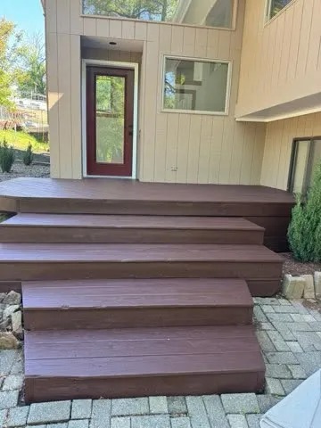 Freshly stained wood steps and entryway porch