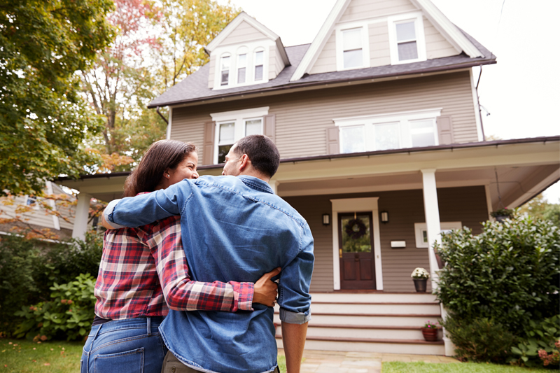 Couple outside home