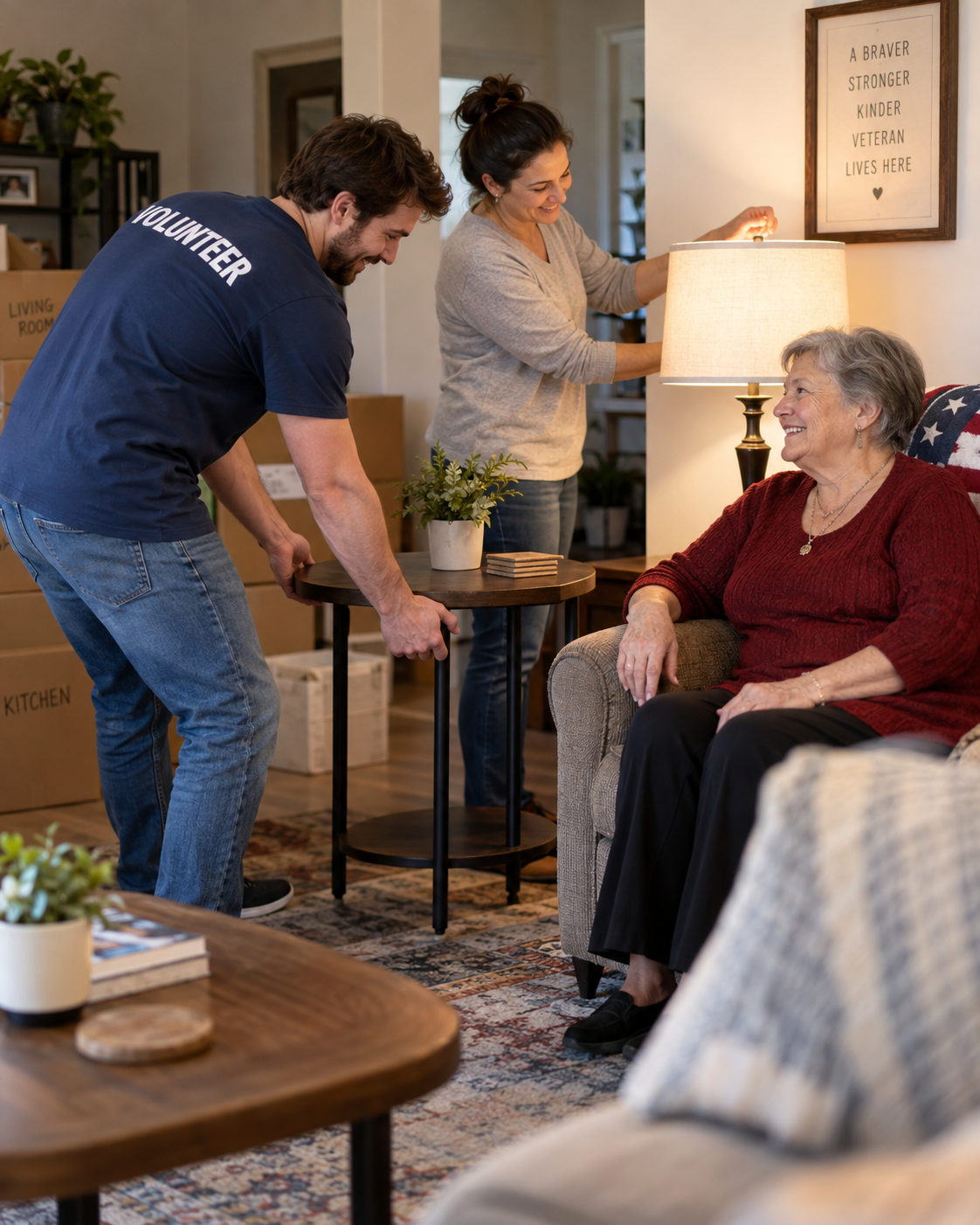 Volunteers setting up end table and lamp for senior veteran woman in her living room