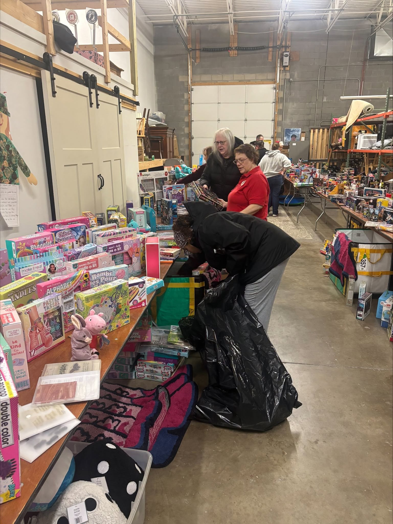 Donated toys, games, and gifts arranged for veteran families during the holiday giveaway