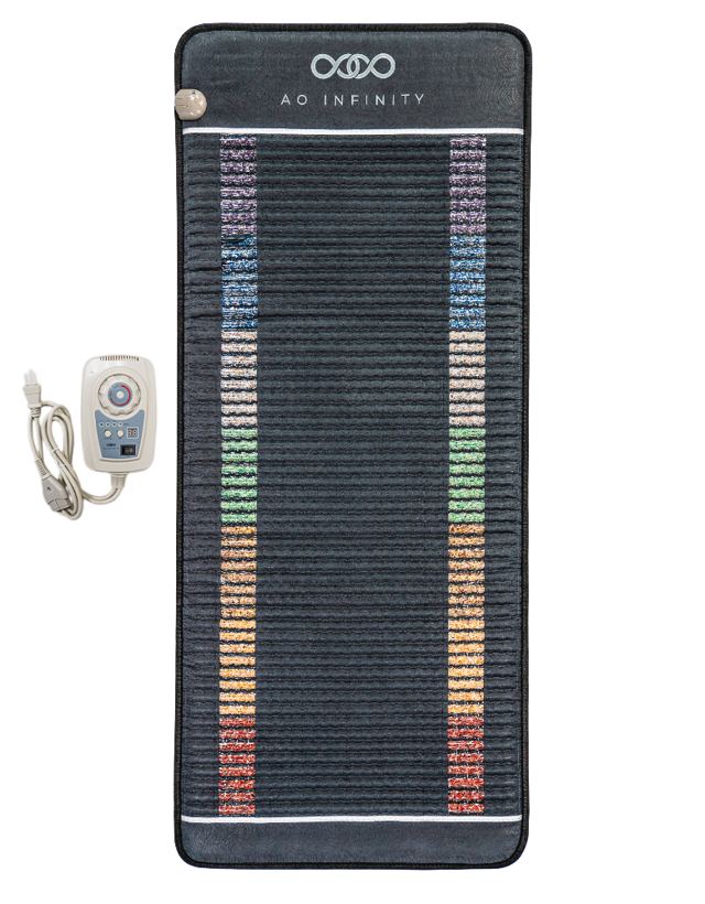 AO Infinity mat with rainbow bands of stones and a handheld controller