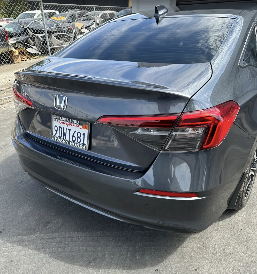 Honda Civic rear quarter panel flawlessly repaired and painted at Focus On Cars Riverside