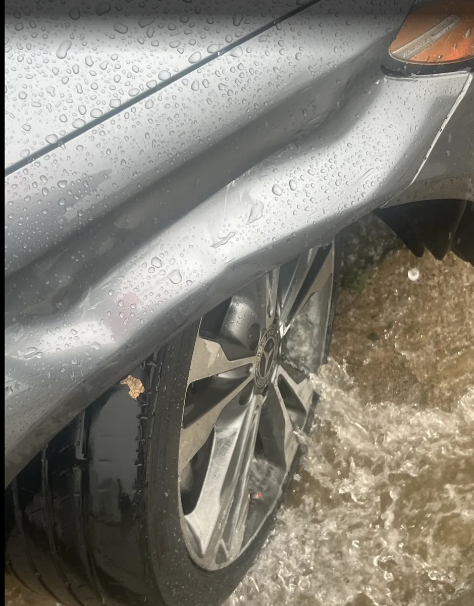Mercedes-Benz deep side panel crease dent before repair at Focus On Cars Riverside