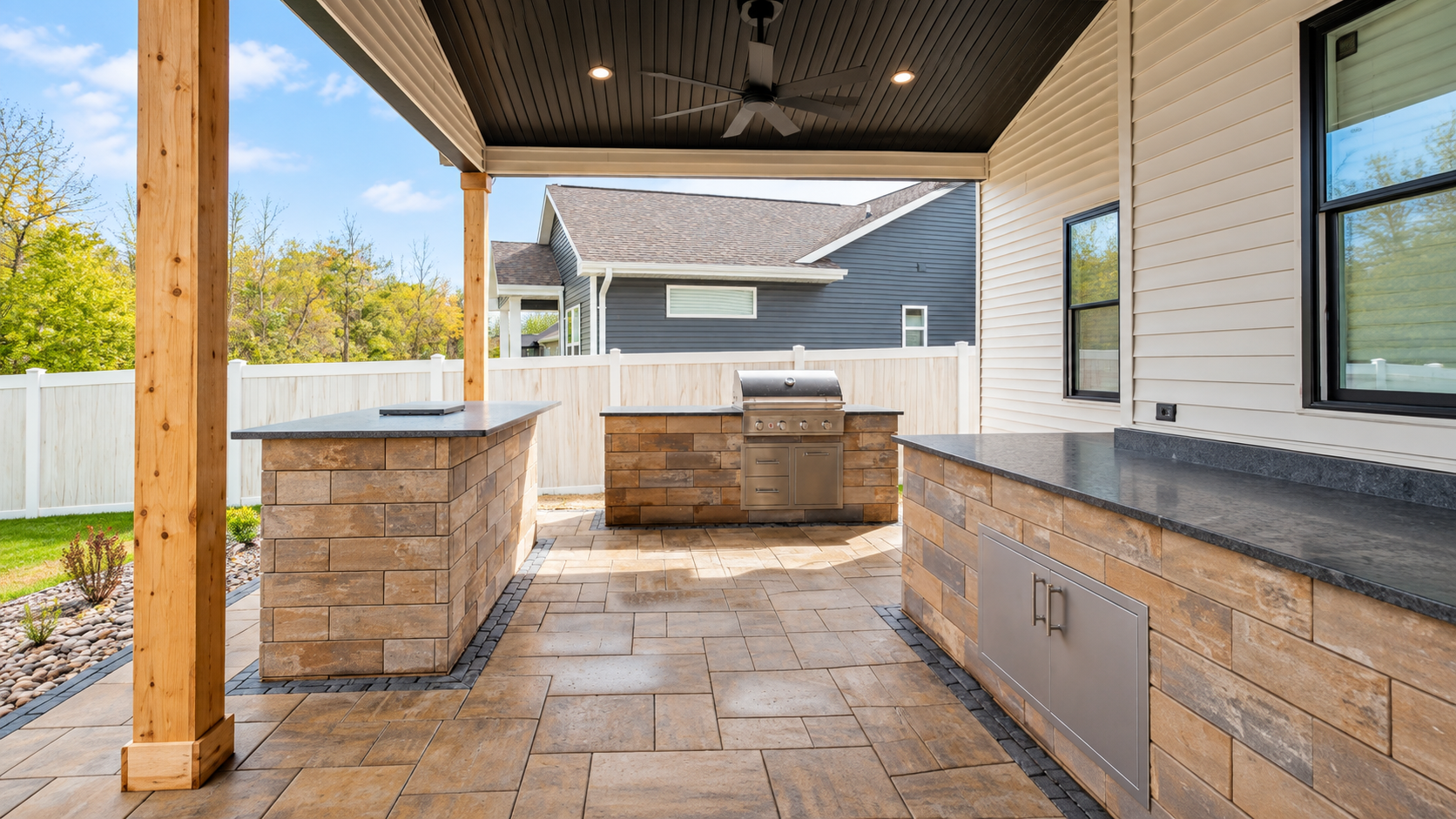 Covered Patio with Outdoor Kitchen & Bar — Paver Patios project in Grand Chute, WI