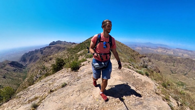 Christopher Hanson choosing his route across high desert ridgeline.