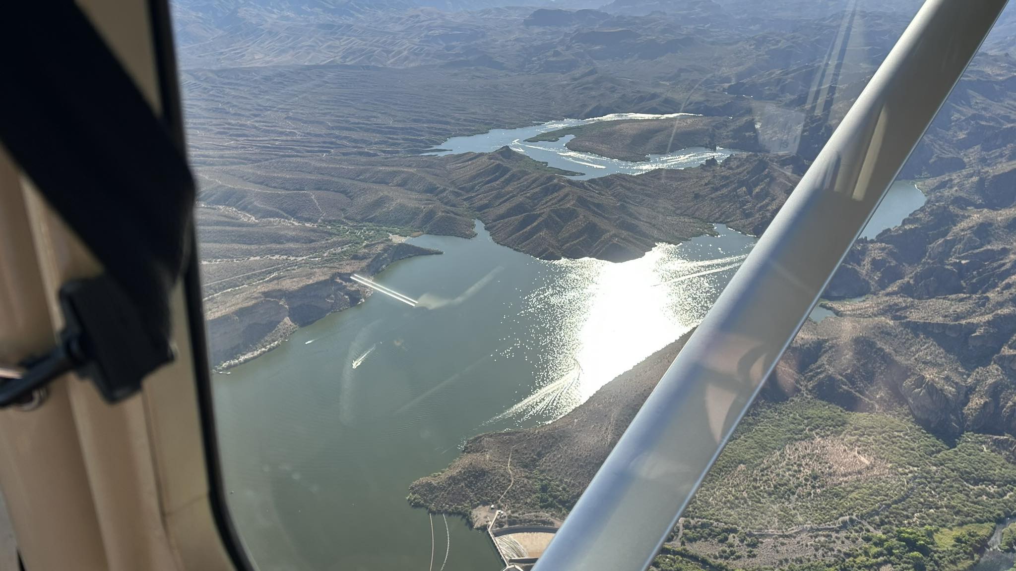 Aerial view of a canyon river carving its line through the landscape.
