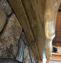 Log and stone detail work by Bruin Builders