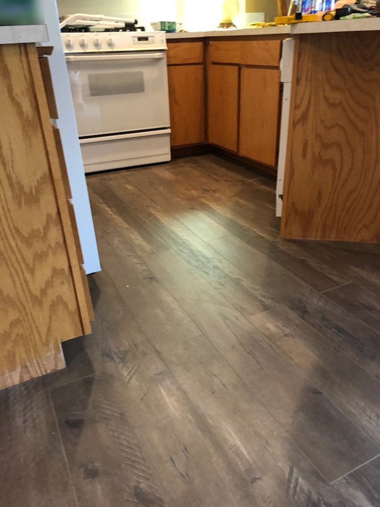 Kitchen flooring install by Bruin Builders