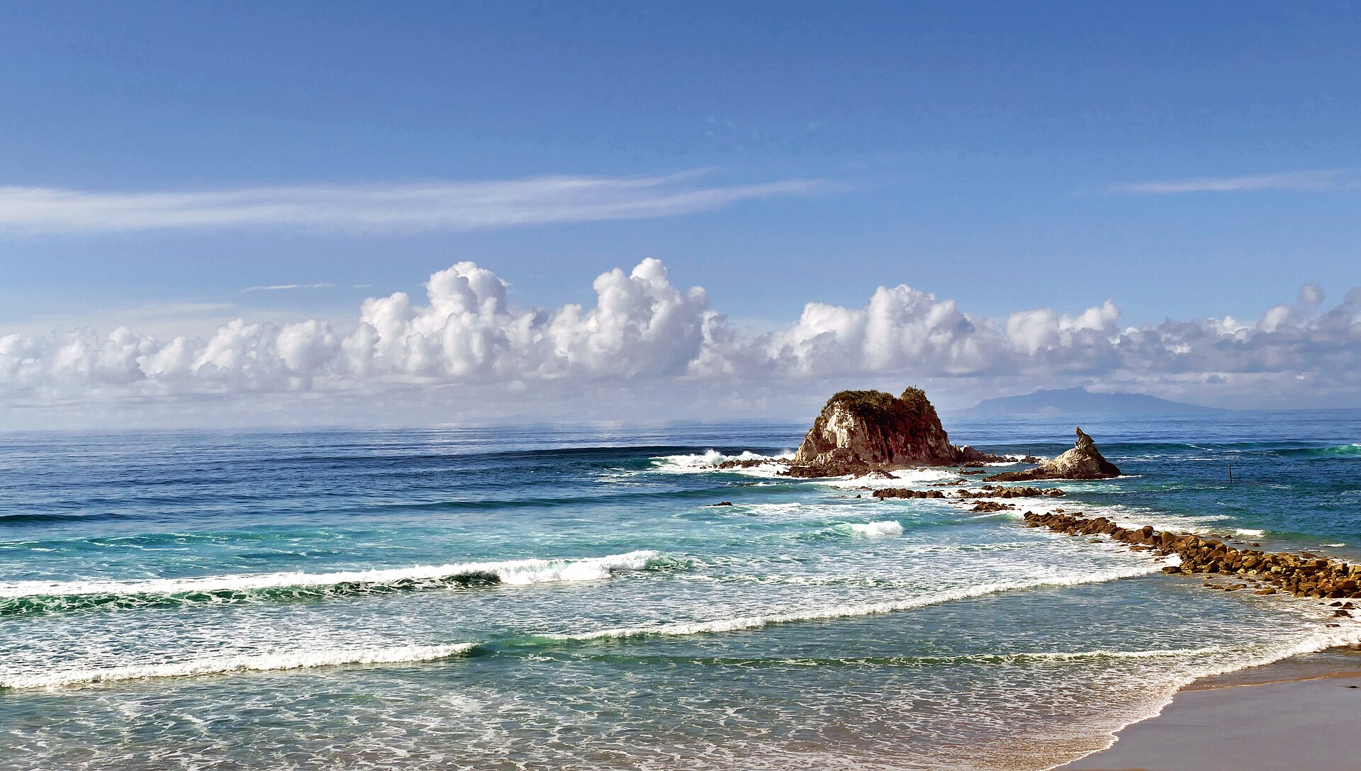 Panoramic coastline of Mangawhai Heads Beach and estuary