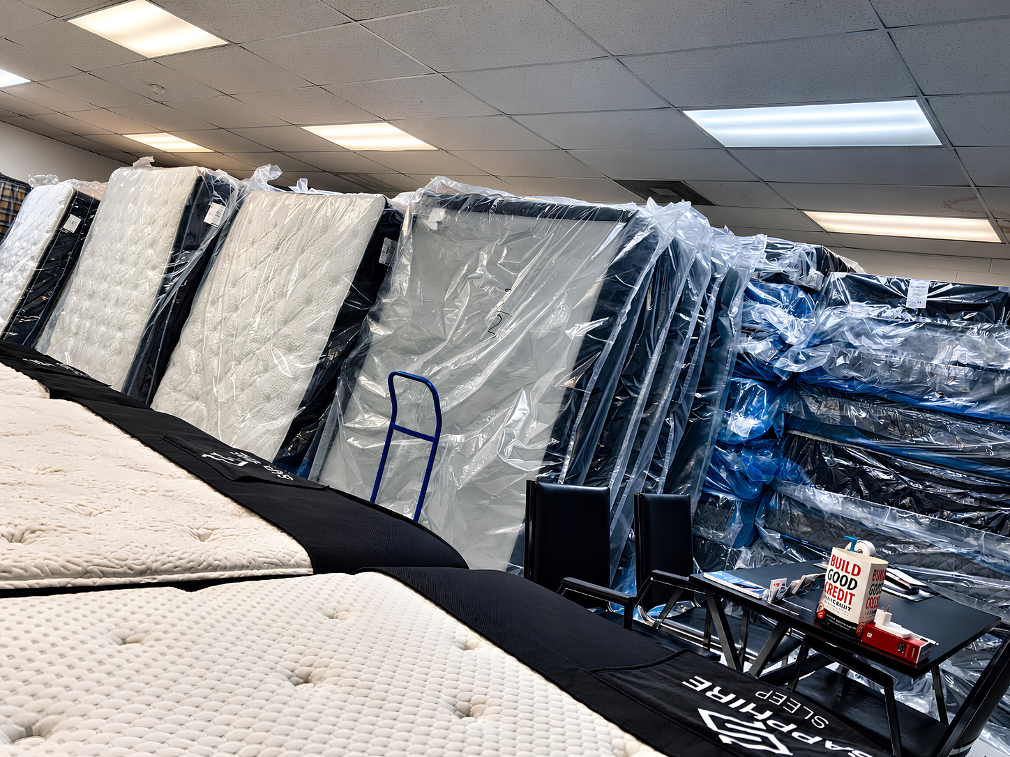 Brand-new sealed mattresses and display beds in the Lodi Mattress Direct appointment showroom