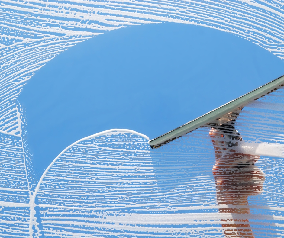 Streak-free window squeegee cleaning
