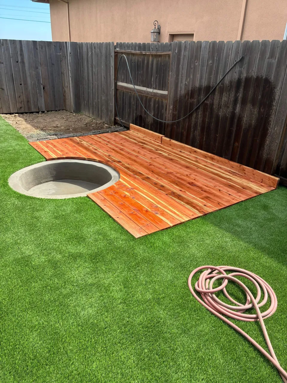 Synthetic Turf Lawn with Custom Redwood Deck & Fire Bowl